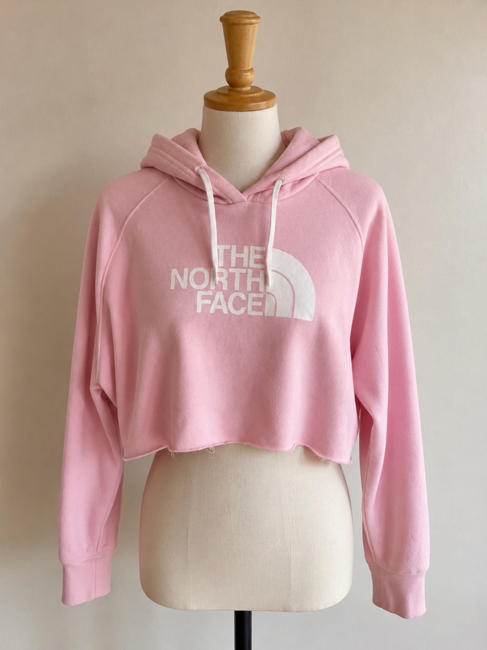 The North Face Pink Cropped Hoodie with Logo
